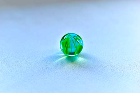 Decorative multicolored glass balls on a white backgroundの写真素材