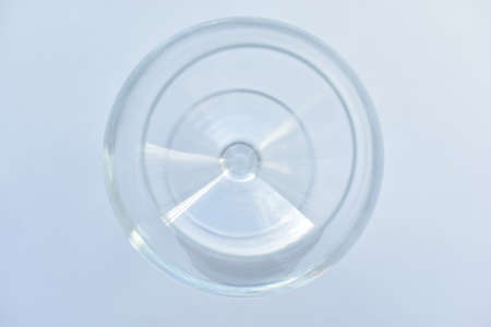 Empty glass goblet on a white backgroundの写真素材