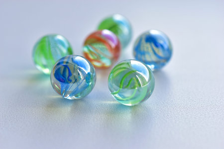 Decorative multicolored glass balls on a white background