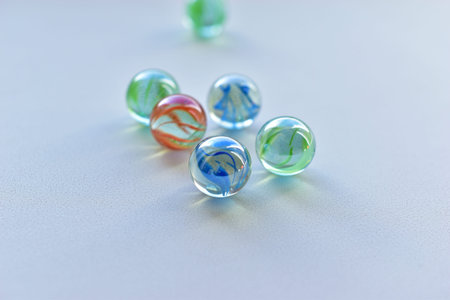 Decorative multicolored glass balls on a white background