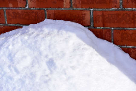 White fluffy snow in winter in a snowdriftの写真素材