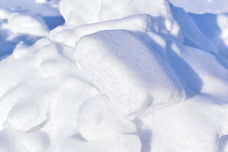 White blocks of snow in the winter afternoon