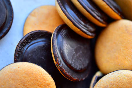 Biscuit cookies with chocolate and filling in a boxの写真素材