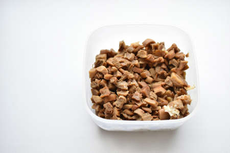 Fried pieces of delicious mushrooms in a containerの写真素材