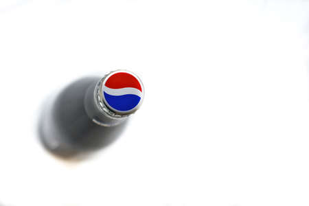 Glass bottle with Pepsi cola on a white backgroundのeditorial素材