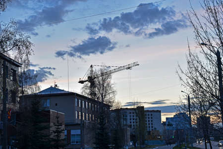 Urban landscape with houses and a tower craneのeditorial素材