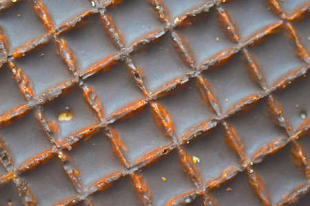 Chocolate round waffle cookies on a white backgroundの写真素材