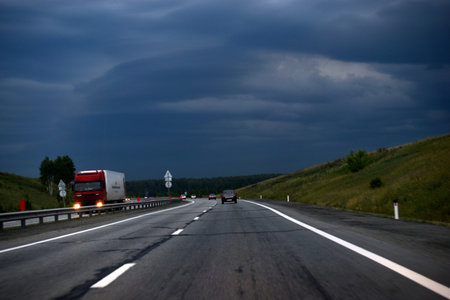 Expressway in the evening with cars and scenery