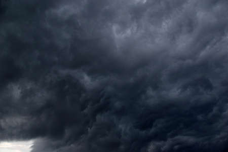 Storm hurricane blue leaden torn clouds on the horizonの写真素材