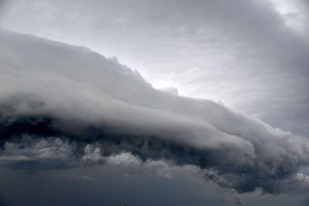 Storm hurricane blue leaden torn clouds on the horizon