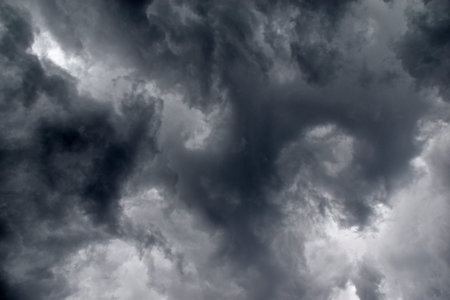 Storm hurricane blue leaden torn clouds on the horizon