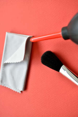 Means for cleaning photo optics. An air bag and a cleaning brush.の写真素材