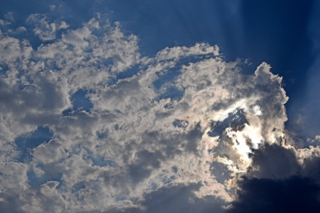 Blue and white cumulus storm clouds thunderstorm landscape