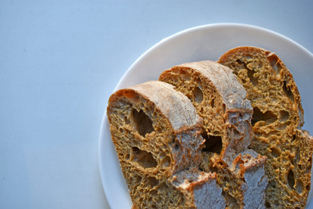 Delicious rye bread sliced on a plate