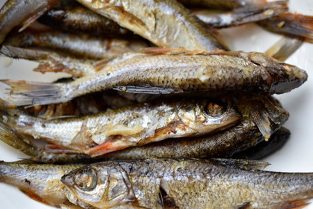 Delicious fried river fish on a plateの写真素材