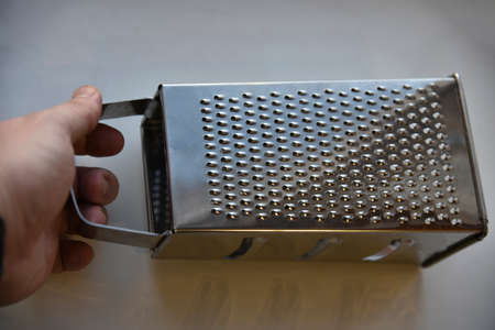 Stainless Steel Vegetable Grater Close-upの写真素材