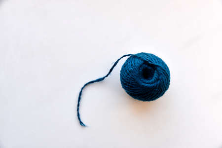 A skein of six-colored blue threads on a white backgroundの写真素材