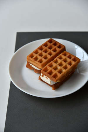 Viennese soft waffles on a white plateの写真素材