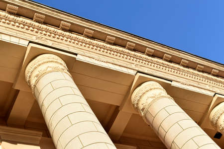 Classic yellow large building with columns in the evening.の写真素材