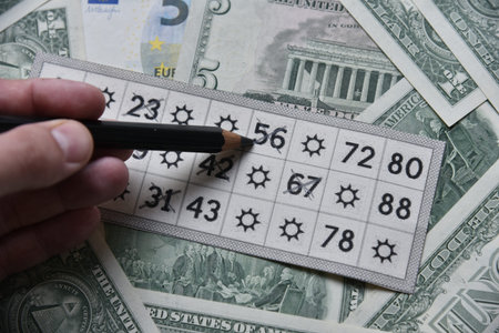 Dollar bills and lottery tickets with a pencil.Wealth concept. travel concept.