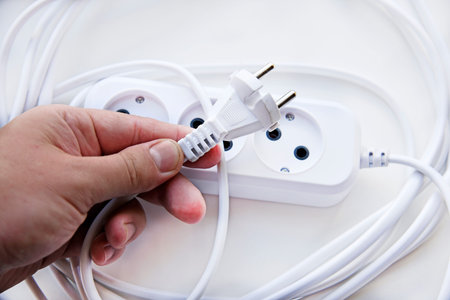 White electric extension cord, great design for any purpose. white background. network extension...