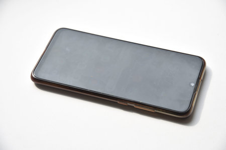 A black smartphone on a white background. modern design.