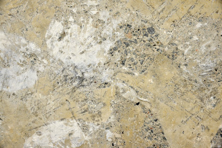 Gray concrete wall and plaster in the house close-up.Modern design.