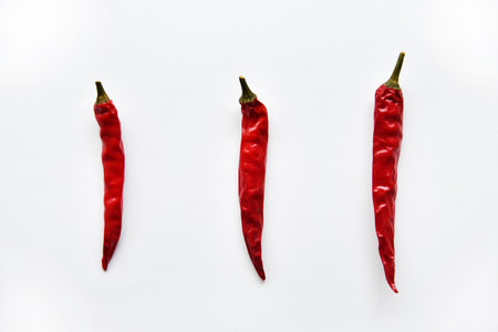 Red hot capsicum on a white background. Red pepper close-up.Bright background. natural background.