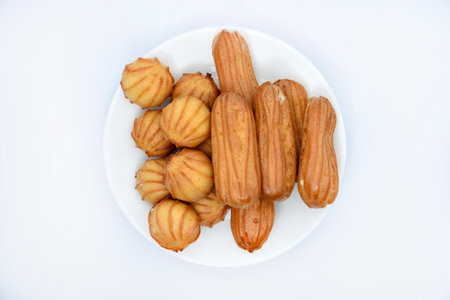 Custard cake with filling. Sweet eclairs. Flour cake with sweet filling.の写真素材