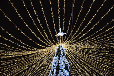 Chelyabinsk, Ural Russia - 01 03 2023: New Year's Square in the center of Chelyabinsk and an ice town with sculptures. Christmas lights in the night city.のeditorial素材