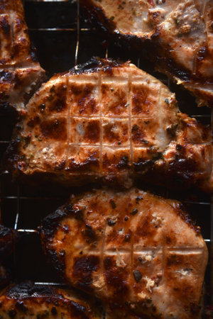 Pieces of fried pork meat. Barbecue. Delicious fried pork loin. Chunks of meat in close-up. Meat on...