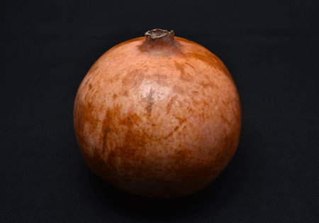 Pomegranate fruit isolated on black background. studio shot.の写真素材