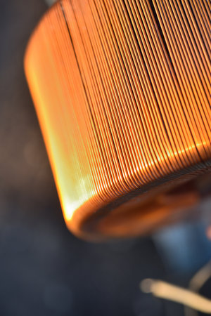 Copper coil. Copper wire wound on a coil. Copper scrap.の写真素材