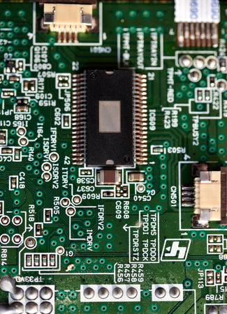 Blue board with radio elements. A chip with a processor and transistors. diodes and resistors....