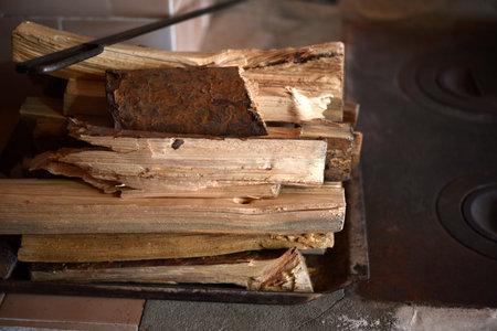 Chopped firewood. Wooden firewood for kindling the stove. Wood fuel.