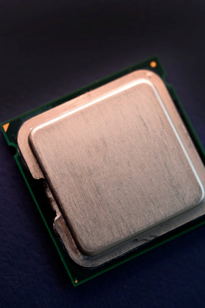 The shiny cover of the computer processor. Multiple processors on a blue background. Computer...