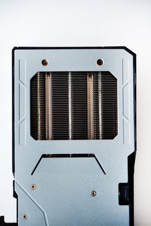 The case of the video card on a white background. A device for a computer. The radiator of the video...