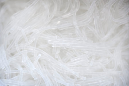Rice noodles in close-up. Noodles in a cardboard box. Fast food.