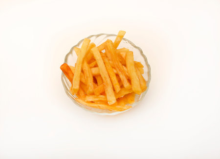 French fries in a glass cup. Fried potato.