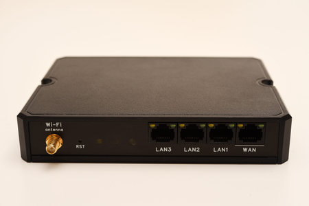 An Internet station with a SIM card. A black router on a white background.