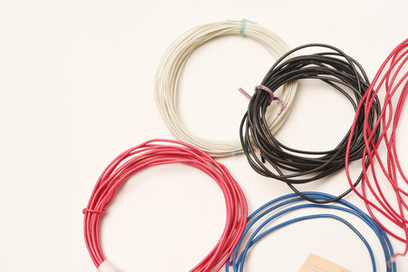 Coils of multicolored wires for electronics. Wires for devices.の写真素材
