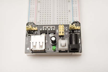 A solderless breadboard for electronics. An assembly tool for radio amateurs.