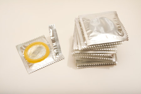 An open condom in a package.の写真素材
