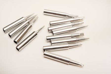 Shiny soldered iron tips. Electric soldered iron tip on a white background.の写真素材