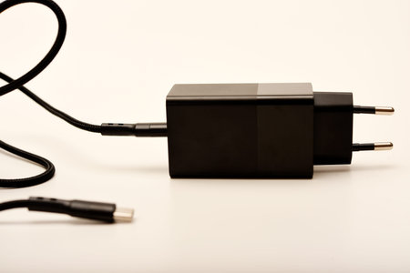 A new charger for gadgets with a wire. USB charging with a wire.