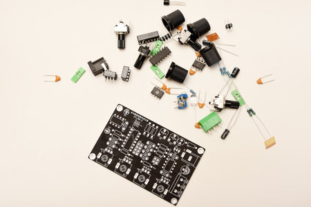 A complete DIY electronics kit for assembling a functional radio device, featuring diverse radio components and a printed circuit board. Perfect image representing the hands-on learning and project-building process for electronics enthusiasts.の写真素材