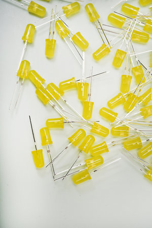 Yellow LED lamps. A scattering of electronic elements. Light-emitting diodes.の写真素材