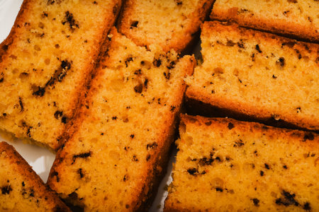 A delicious cupcake with a crumb of chocolate. Bread with chocolate. A sweet cupcake.