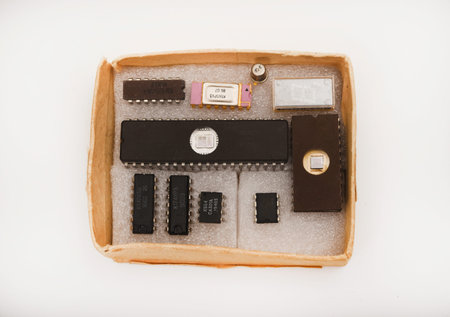Several different chips on a white background. Old electronic chips.