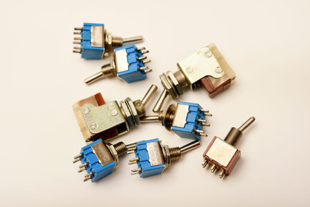 Small electric switches. Electric toggle switch. Blue switches.の写真素材